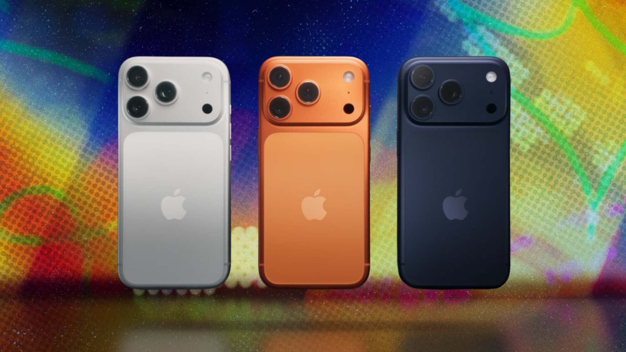Three iPhone 17 Pro Max phones in different colors
