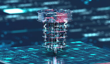 An abstract CGI representation of a quantum computer, hovering above a blue touch-screen, computer landscape.