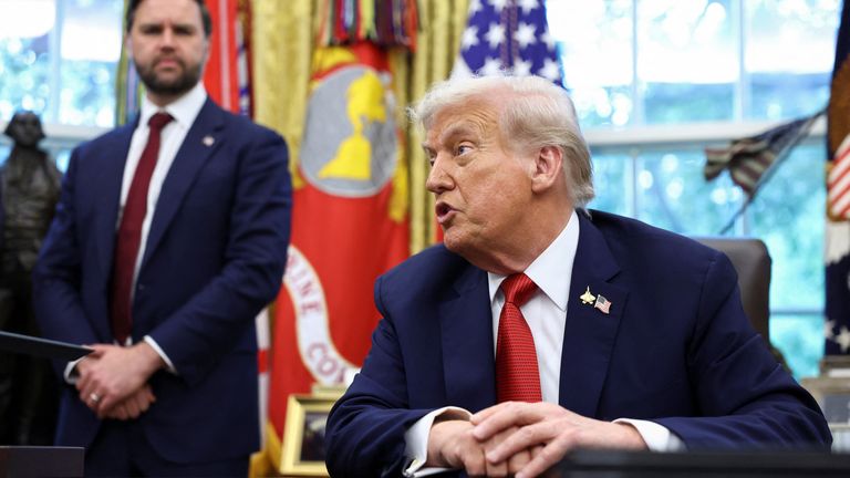 Donald Trump (pictured today in the White House) hailed the charges as "JUSTICE IN AMERICA" on Truth Social. Pic: Reuters