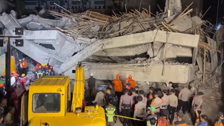 The  collapsed school building. Pic: AP