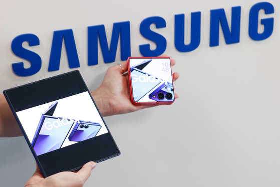A Samsung Electronics official introduces the new foldable smartphones Galaxy Z Fold 7 and Flip 7 at a product media briefing at the company's press room in Jung District, central Seoul on July 10. [YONHAP]