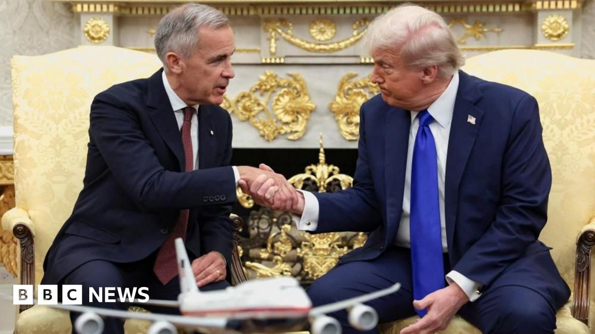 Trump says US and Canada have ‘natural conflict’ on trade as he meets Carney in White House - live updates