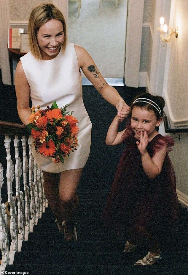 Beth Stichbury, from Tonbridge in Kent, suddenly began experiencing stomach problems in 2015 and first went to her GP aged 20 when she suffered constipation and occasional bleeding. Pictured, with her daughter Willow during her wedding day in August