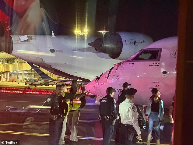 Passengers and crew were seen on the runway after the damaged planes came to a stop