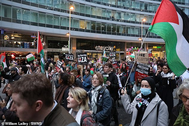 As the Jewish community went into mourning, tonight pro-Palestine protestors were seen marching through Manchester while being surrounded by police