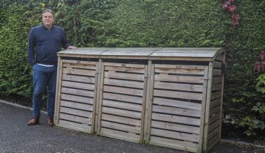 When the Harrison-Ellis' added a small wooden bin store on their driveway in 2022 it prompted the Hunts to object and launch legal action that ended up in the High Court