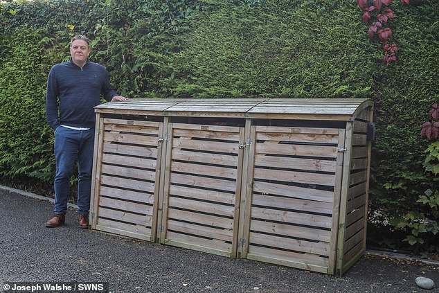 When the Harrison-Ellis' added a small wooden bin store on their driveway in 2022 it prompted the Hunts to object and launch legal action that ended up in the High Court