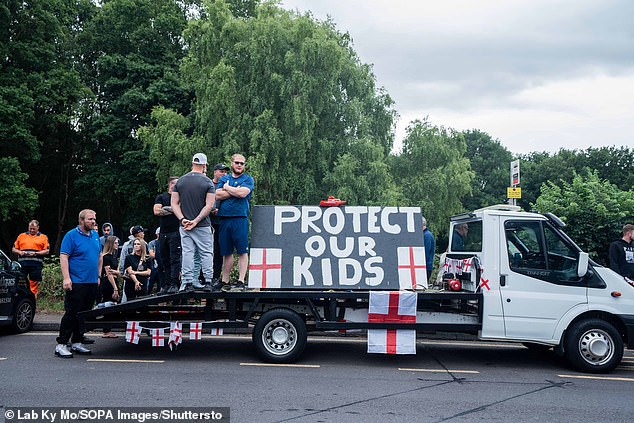 A flat bed van carrying a sign that said 'protect our kids' was paraded at the protest, Chelmsford Crown Court was told today