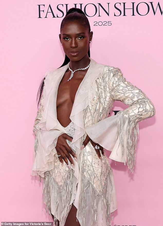 The Anne Boleyn star elevated her frame in a pair of clear stilettos and accessorised with an eye catching diamond necklace