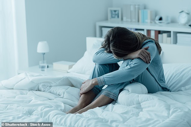 With RLS, sufferers feel an irresistible urge to move their legs to find relief, most often late at night (stock image posed by model)