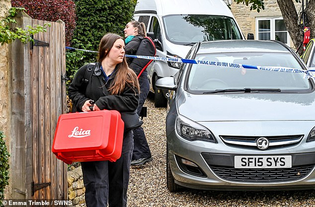 The cause of her death remains unknown, despite a post-mortem examination (Pictured: Police and forensics at the scene on Wednesday)