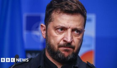 A promo promoting the News Daily newsletter - a graphic of an orange sphere with two concentric crescent shapes around it in a red-orange gradient, like a sound wave.