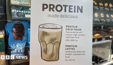 A supermarket shelf with high-protein products, including drinks and yoghurts.