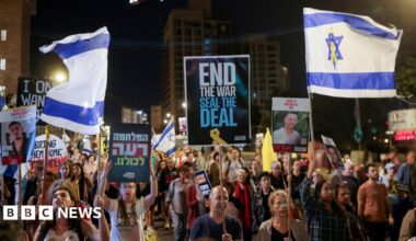 Demonstrators carry flags and placards as families of hostages and their supporters protest ahead of the two-year anniversary of the deadly October 7, 2023, attack on Israel by Hamas, demanding the immediate release of all hostages and the end of the war in Gaza, in Jerusalem, October 4, 2025.