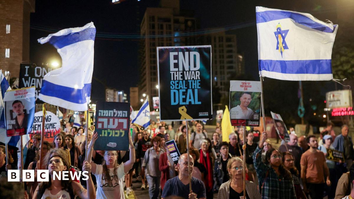 Demonstrators carry flags and placards as families of hostages and their supporters protest ahead of the two-year anniversary of the deadly October 7, 2023, attack on Israel by Hamas, demanding the immediate release of all hostages and the end of the war in Gaza, in Jerusalem, October 4, 2025.