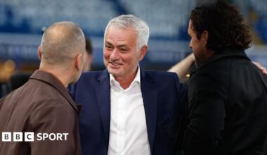 Benfica manager Jose Mourinho talks to former player Joe Cole at Stamford Bridge