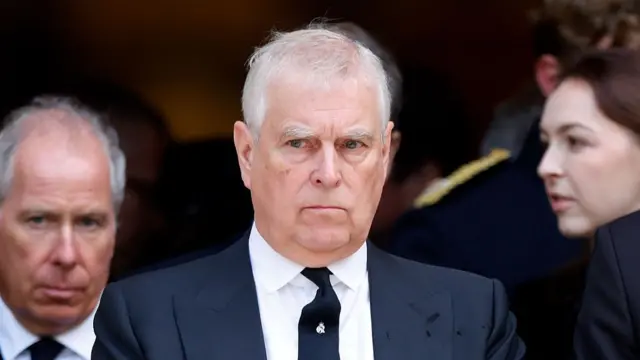 Prince Andrew in black suit and tie looking grim while attending the funeral of the Duchess of Kent in September 2025