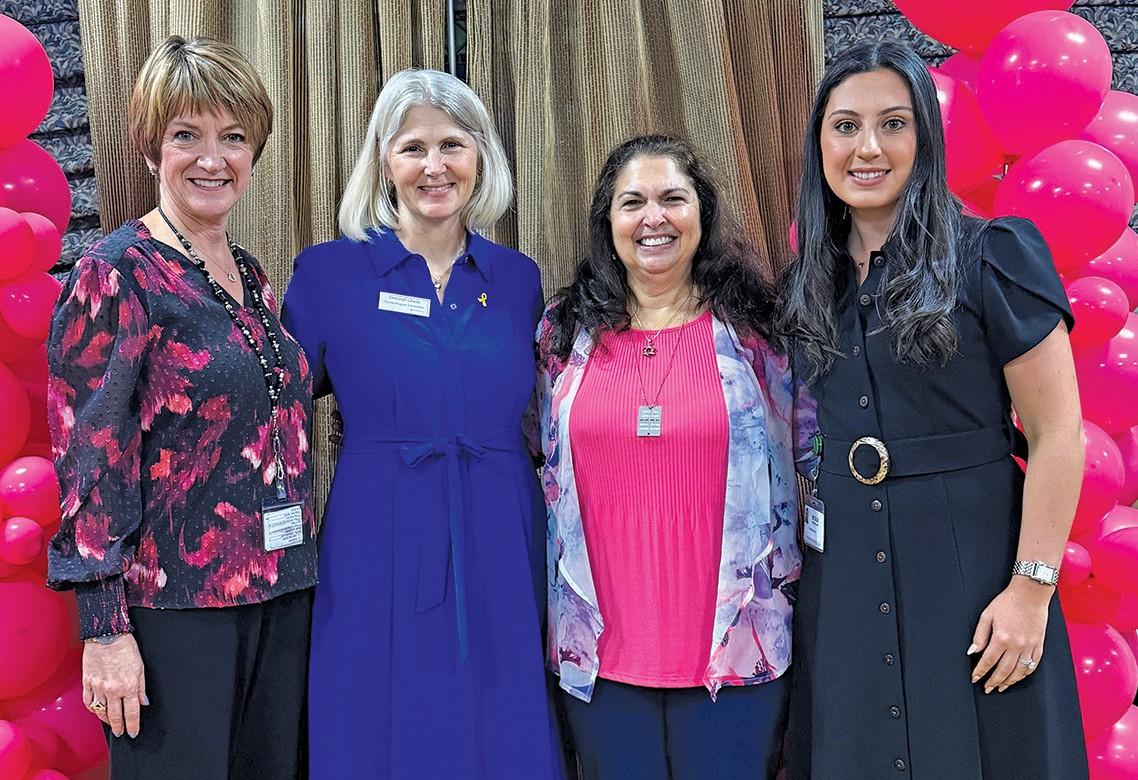 At breast cancer “tea” hosted by Menorah Life and Sharsheret program: Donna Perryman, Menorah Life CEO, Deborah Litwak from Sharsheret, survivor Laurie Reiskind and Nicole Spencer of Menorah Life.