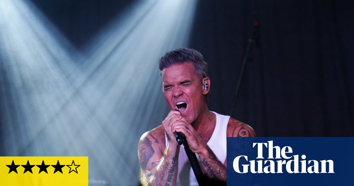 Robbie Williams review – tiny Camden gig offers blinding star wattage – and a surprising new song about Morrissey | Robbie Williams