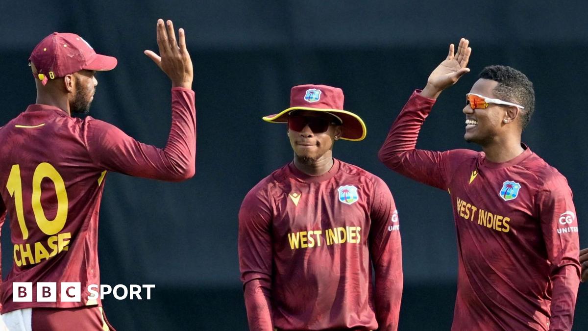 Akeal Hosein celebrates taking a wicket during West Indies' win over Bangladesh