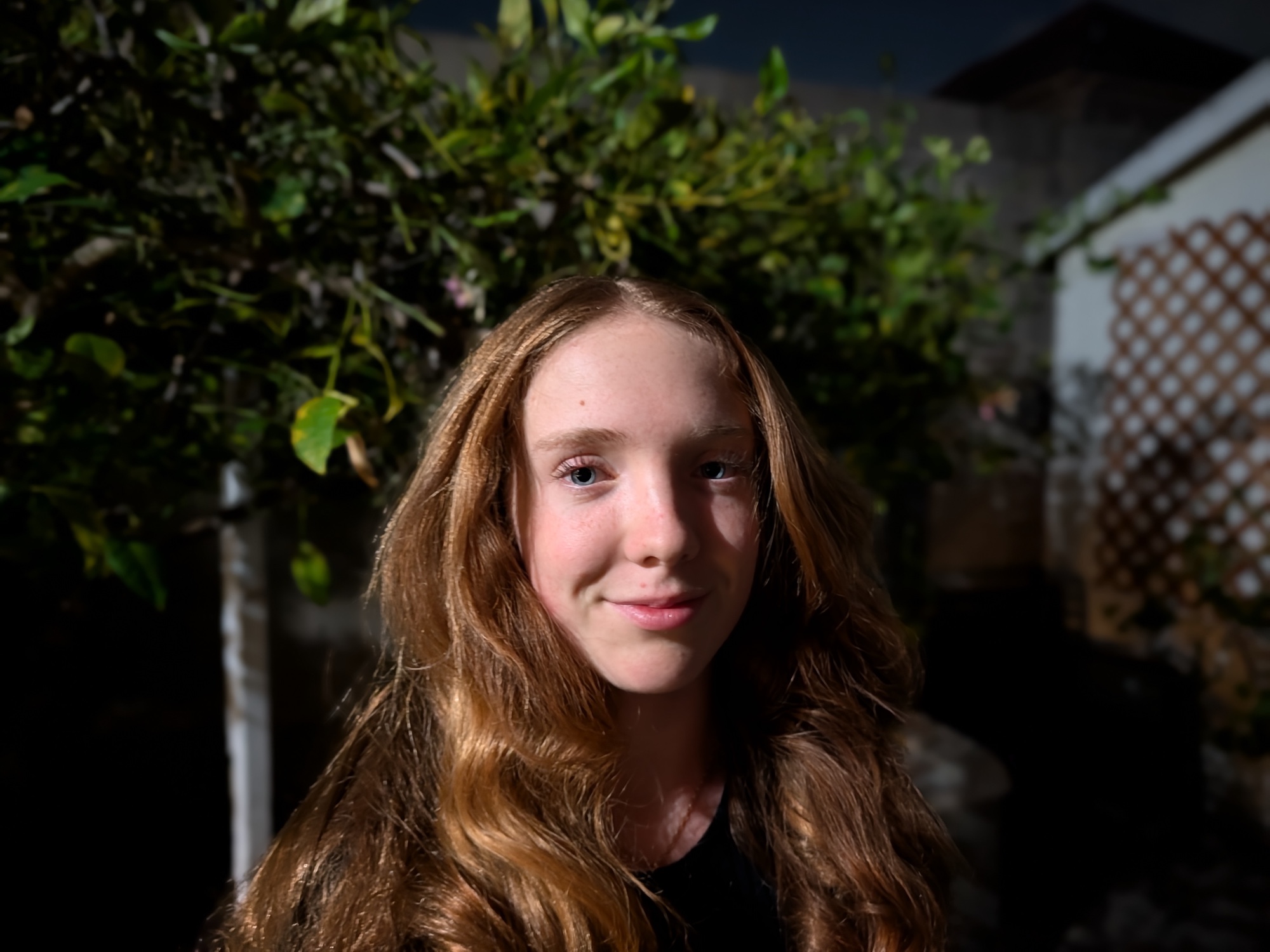 night portrait of teenager by pixel 10 pro