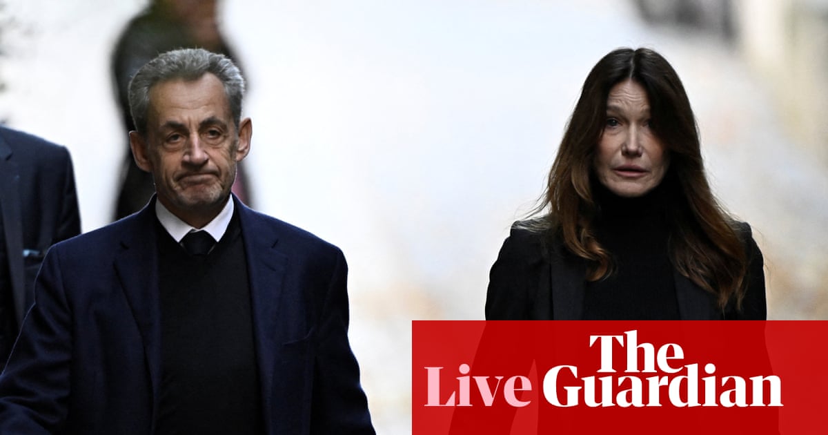 Defiant Sarkozy begins jail sentence as lawyer says he will be held in solitary confinement – Europe live | World news