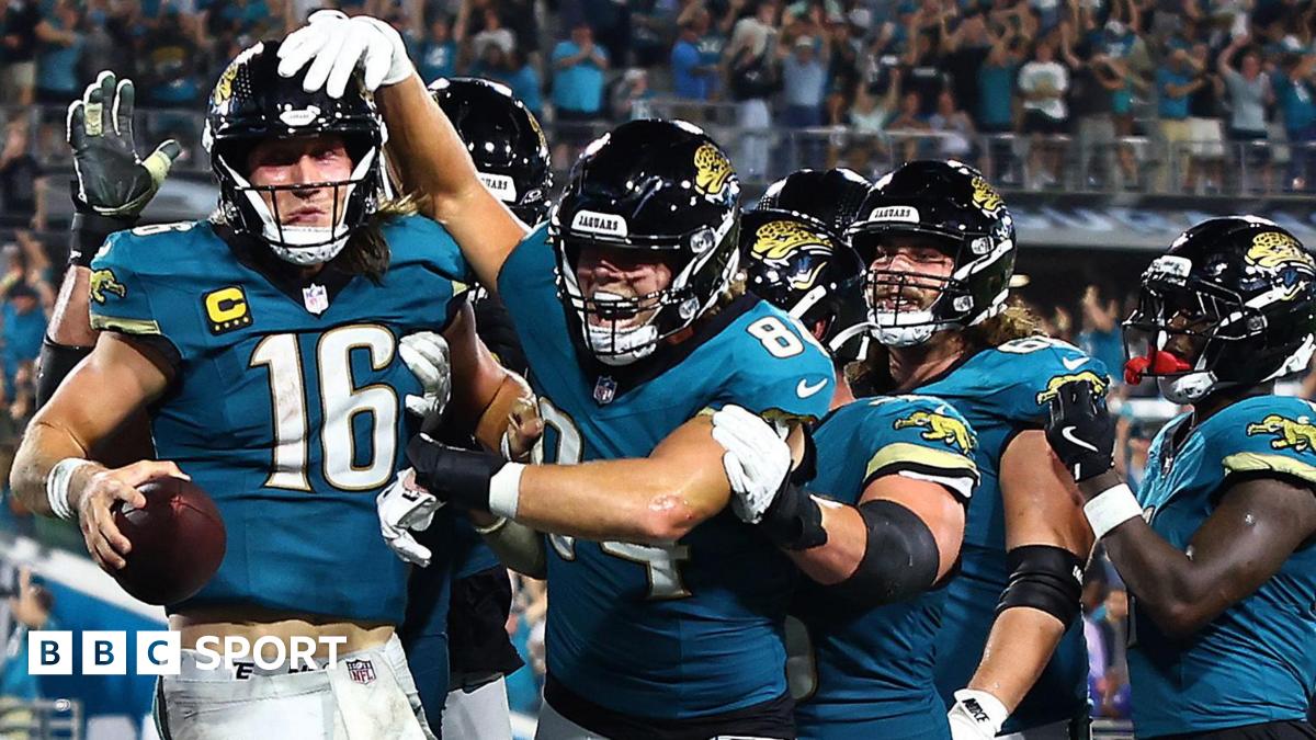 Jacksonville Jaguars quarterback Trevor Lawrence (left) is congratulated by team-mates against the Kansas City Chiefs