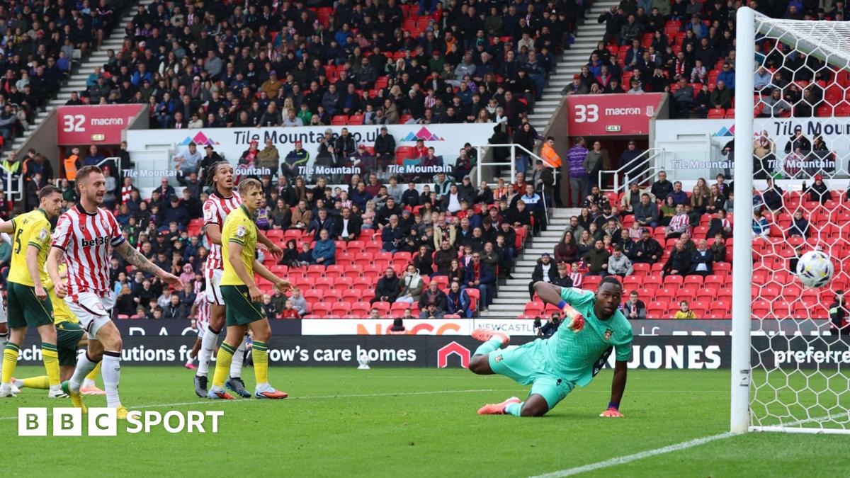 Ange Postecoglou holds his head