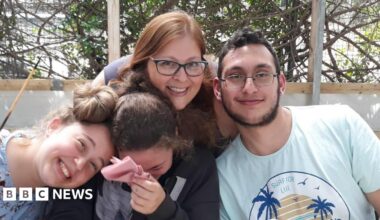 A promo promoting the News Daily newsletter - a graphic of an orange sphere with two concentric crescent shapes around it in a red-orange gradient, like a sound wave.