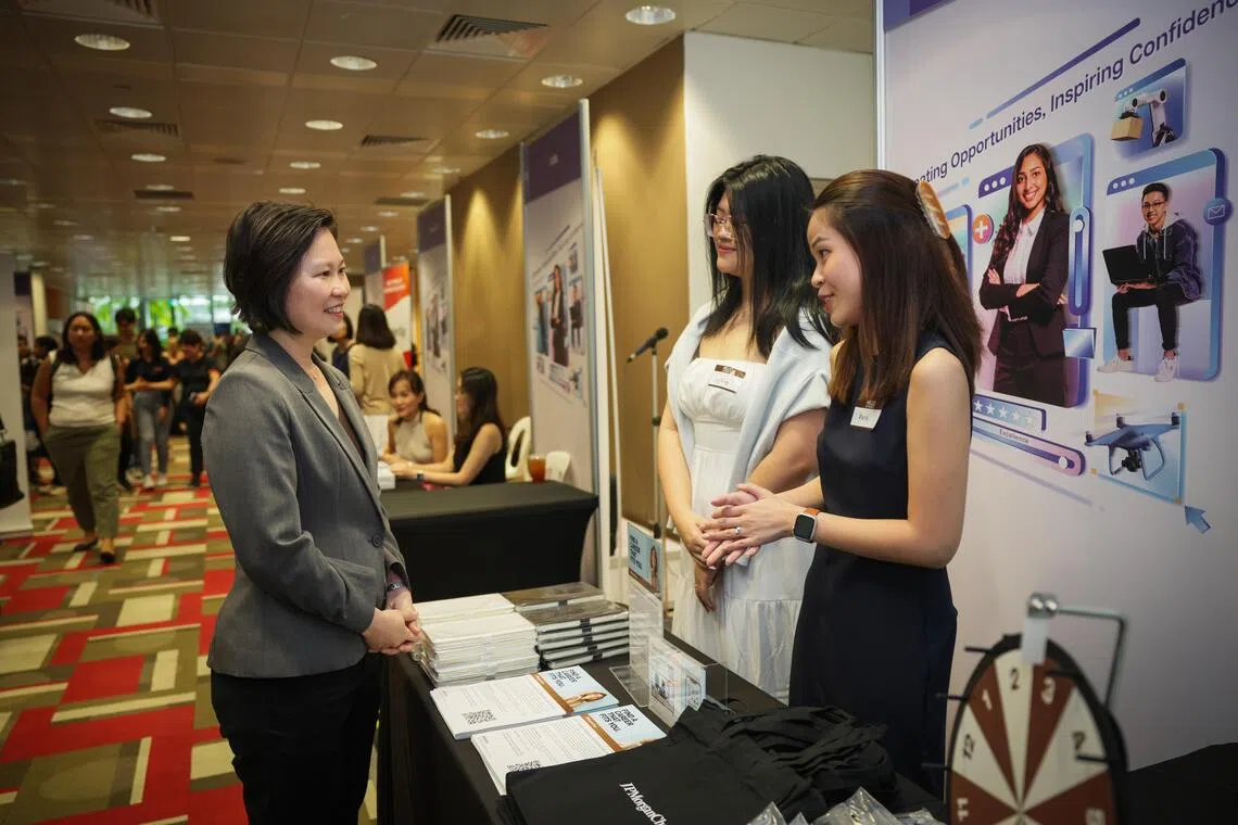 Minister of State for Foreign Affairs and Trade and Industry Gan Siow Huang visiting the JPMorgan Chase booth at Singapore Polytechnic’s Career and Further Education Fair on Oct 22.
