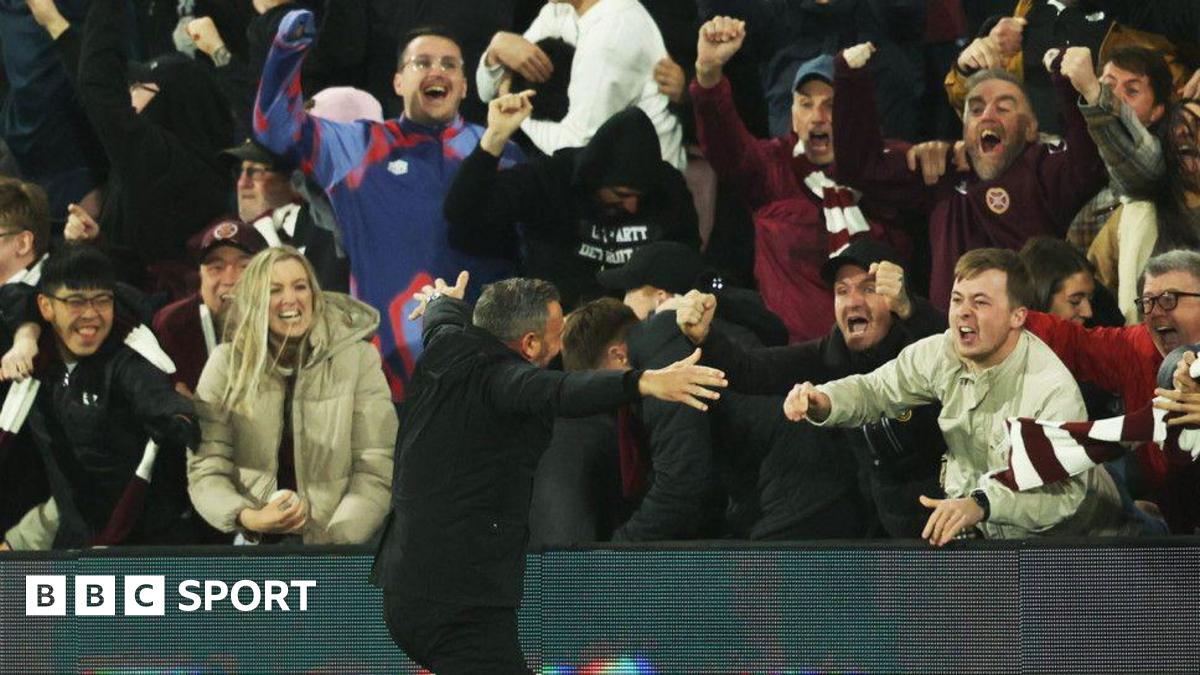 Derek McInnes celebrates with Hearts fans