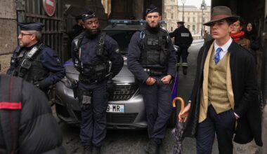 Inspector Clouseau? The mystery man in an AP photo after the Louvre jewel heist creates a buzz