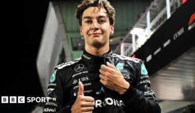 Mercedes' George Russell gives the thumbs-up signal after taking pole position for the Singapore Grand Prix