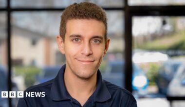 Close-up shot of Daniel Naroditsky wearing a deep navy polo