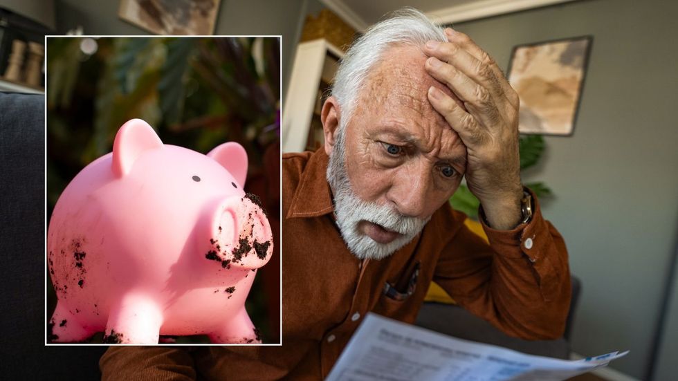 Older man looking at letter and piggy bank