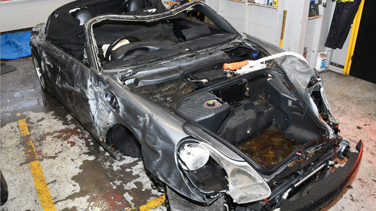 The Porsche after being retrieved from the sea. Pic: Crown Office