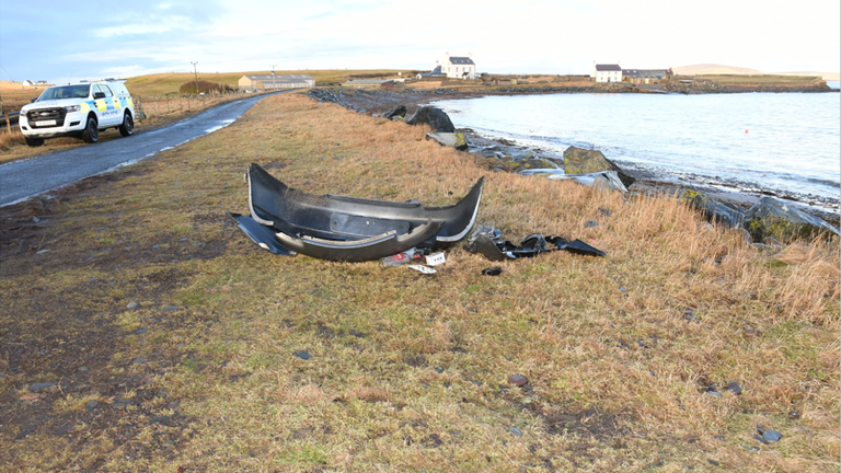 Wreckage from the car on the shore. Pic: Crown Office