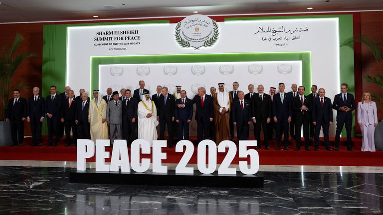 World leaders, including Trump and Egypt's President Abdel Fattah al-Sisi, pose for a family photo. Pic: Reuters
