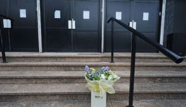 Flowers in memory of the victims are laid at the Heaton Park Hebrew Synagogue in Crumpsall. Pic: PA