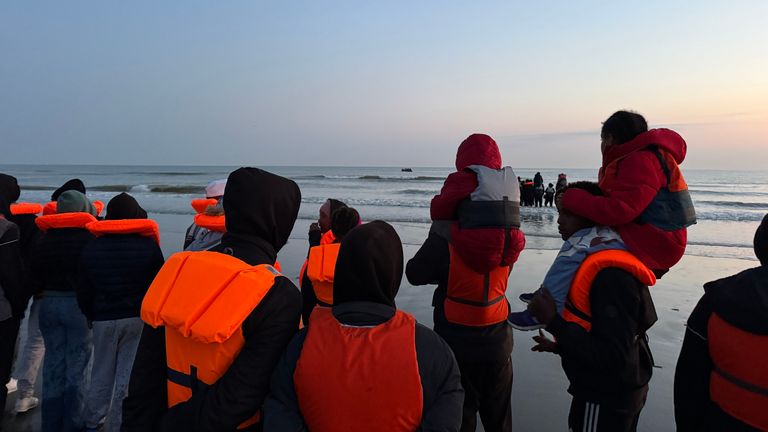 Migrants in Dunkirk, France, preparing to cross the English Channel