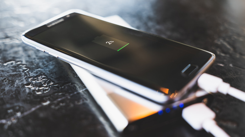 smartphone charging on a countertop