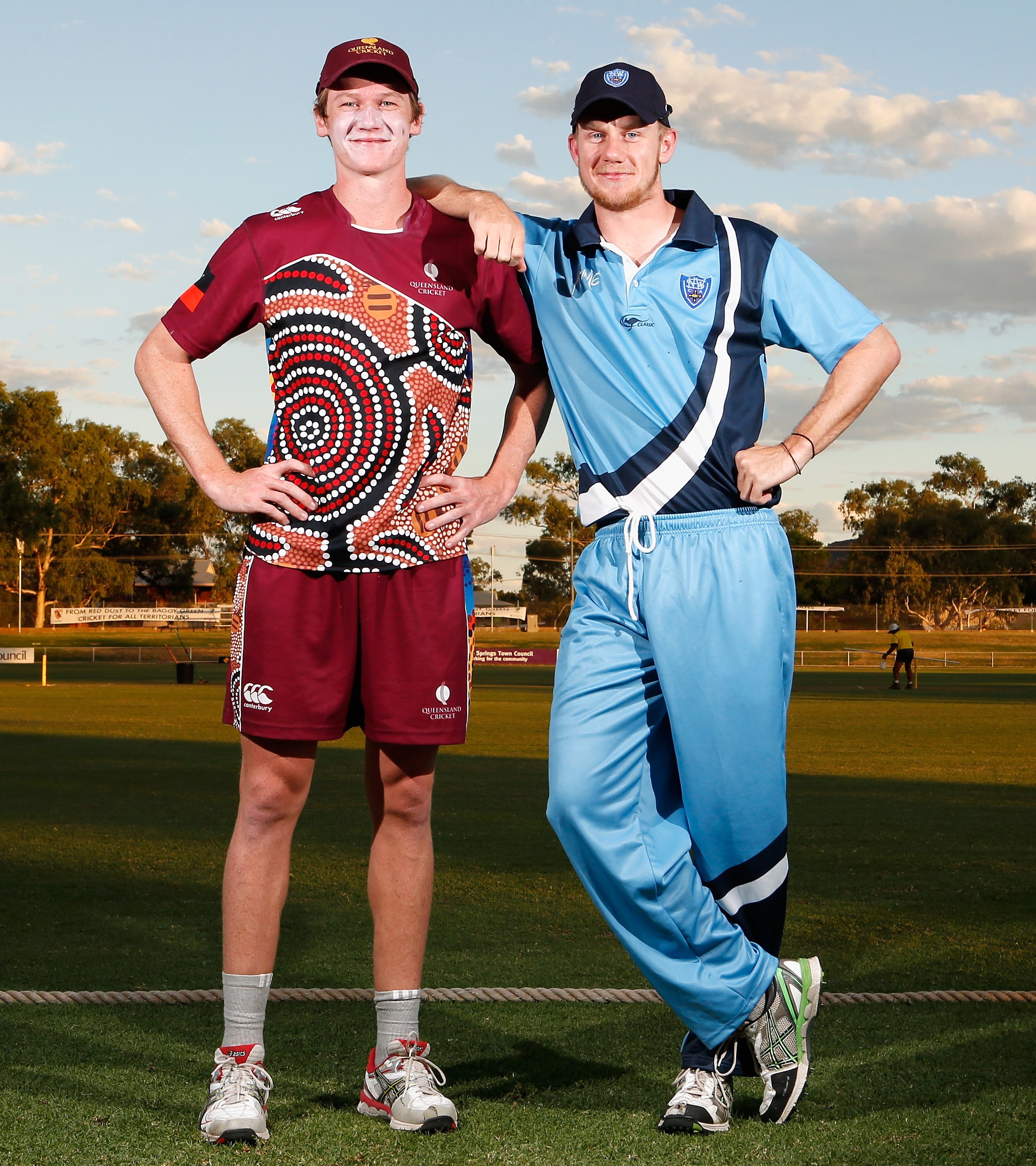 Brendan Doggett of Queensland and Samuel Doggett of New South Wales pose for a photo during the 2015 Imparja Cup.
