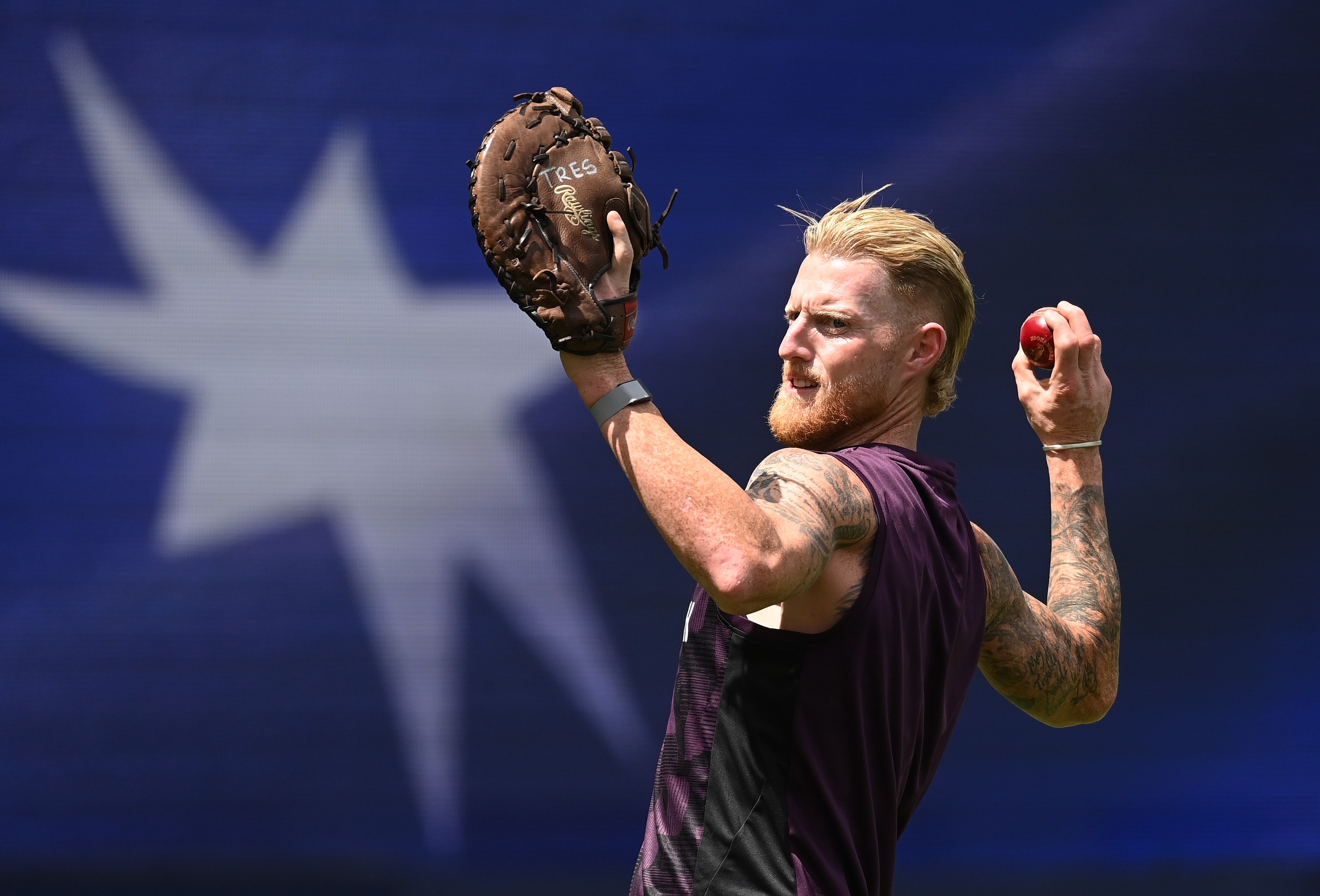 Ben Stokes throws a cricket ball during an England nets session.
