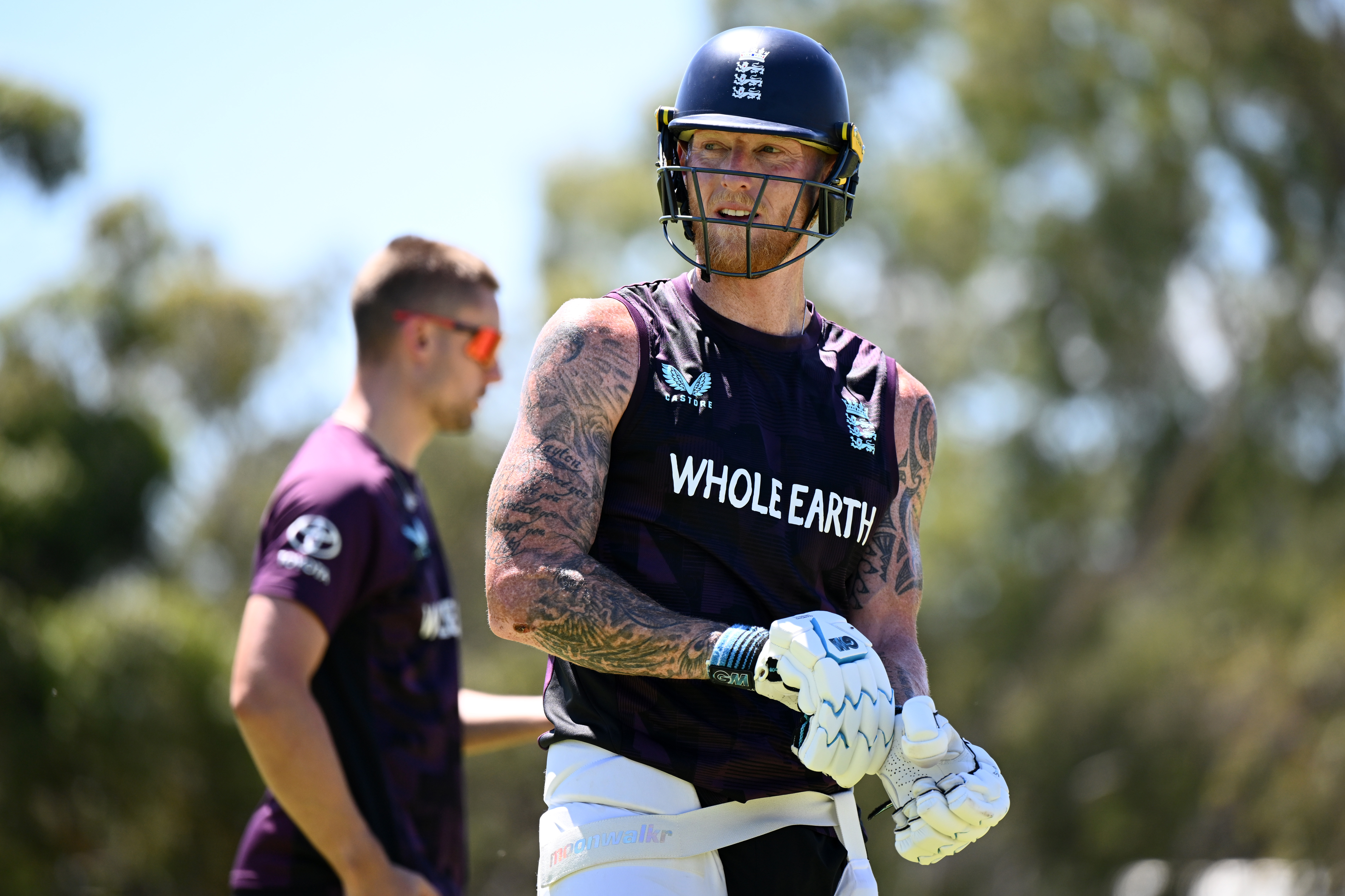 England cricket captain Ben Stokes wearing a helmet and batting gloves during a training session.