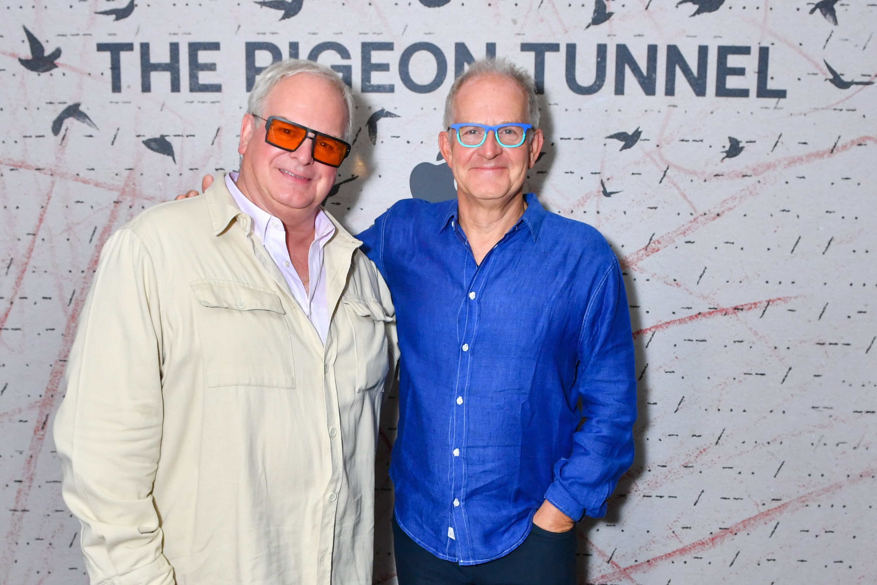 Simon Cornwell and Stephen Cornwell smiling at the premiere of "The Pigeon Tunnel."