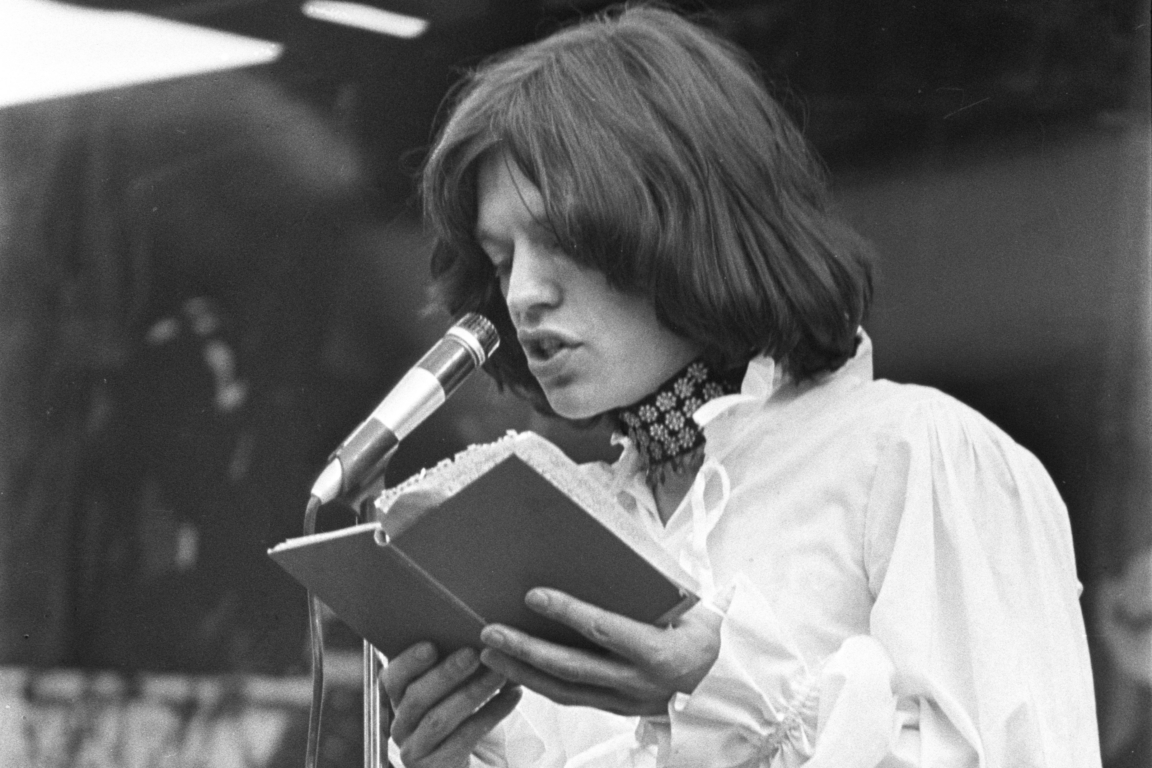 Mick Jagger reading poetry at the Hyde Park concert in July 1969.