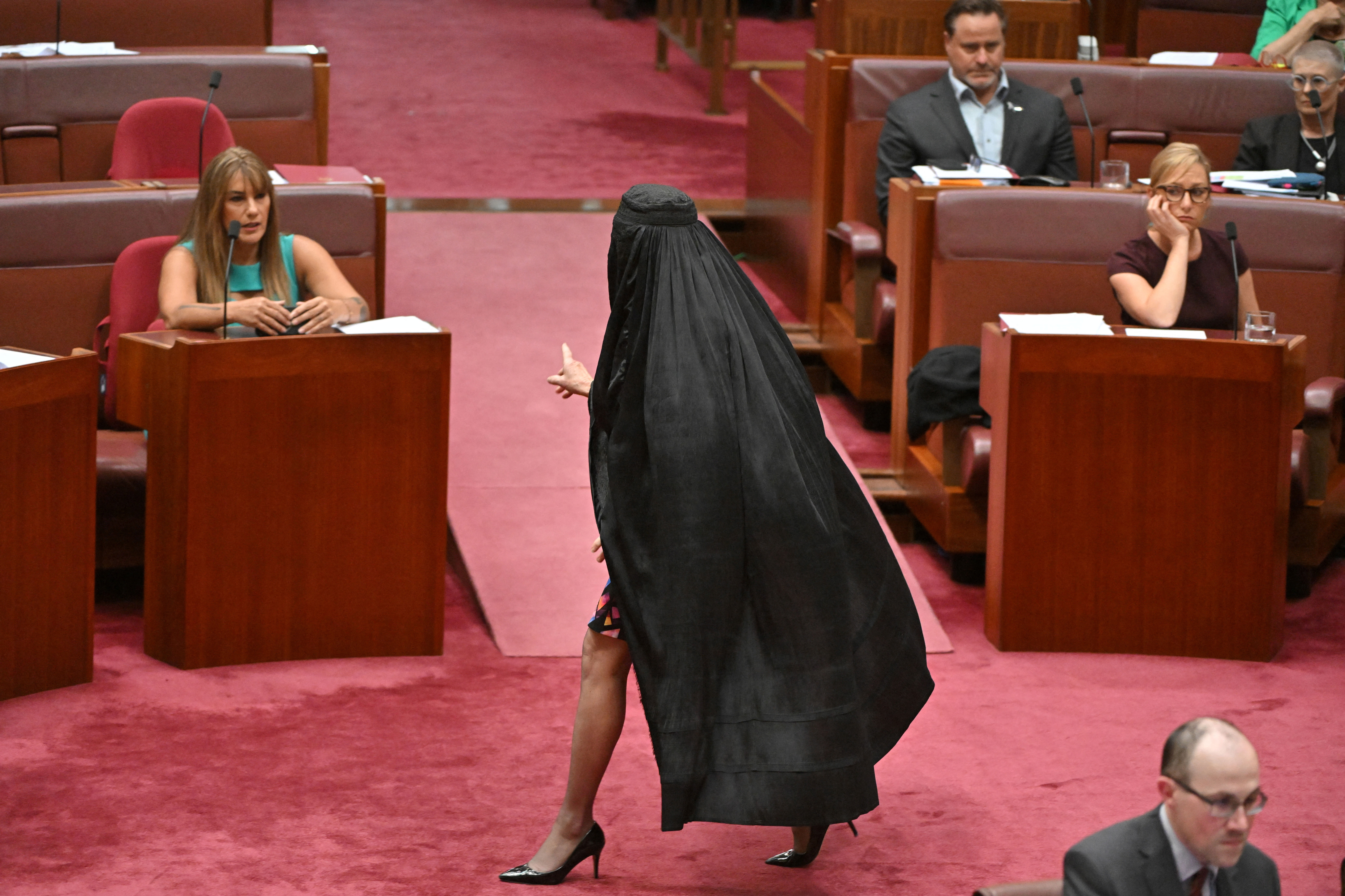 Australian far-right senator wears burqa to parliament, sparking outrage