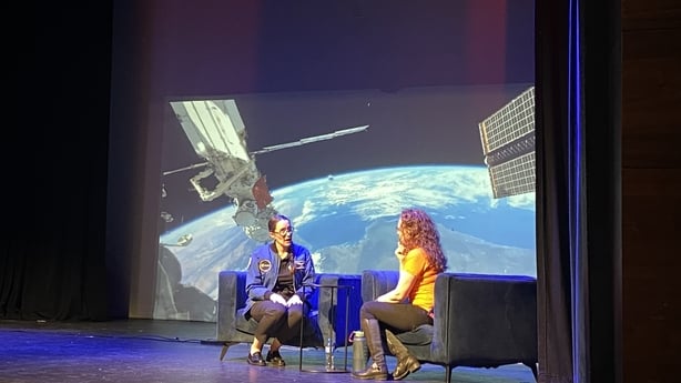 Dr Rosemary Coogan speaking on stage at a science week event in Dundalk