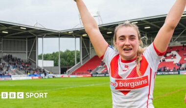 Paige Travis celebrates whilst with St Helens