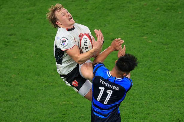 Blair Murray of Wales catches a high ball